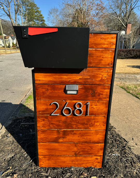 The Scandinavia custom mailbox in honey oak